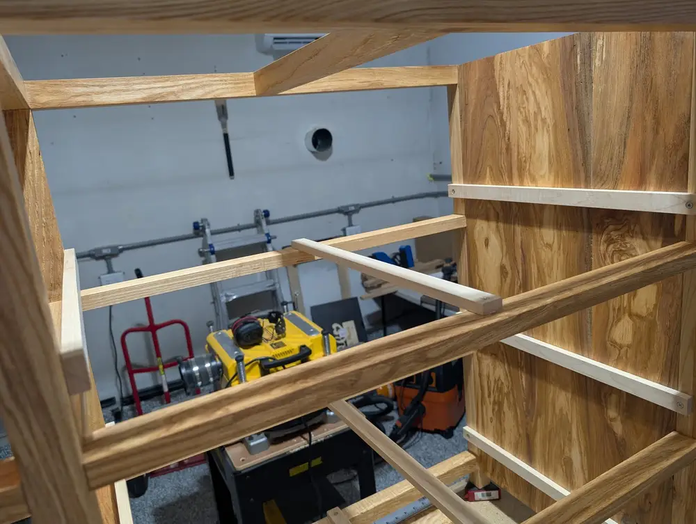 Inside the dresser, showing the hard maple runners — drawers are center-guided and side-hung